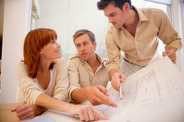 Mortgage Expert Show Building Blue Print to Client to Help Understand